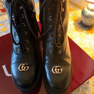 Gucci women’s lace up ankle boot with GG